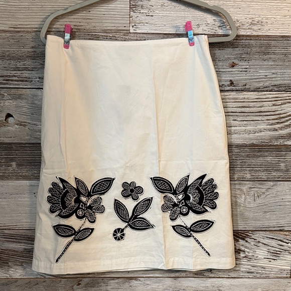 Chaudry Kc Dresses & Skirts - Chic White Pencil Skirt with Black Floral Design